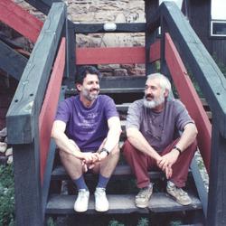 Composer-to-Composer co-founders, Charles Amirkhanian and John Lifton, seated on the back steps of the Telluride Institute, Telluride, CO. (1991)