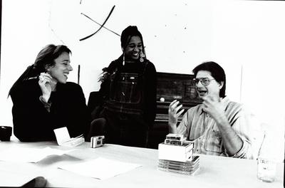 Laetitia Sonami, Pamela Z, and Paul Dresher, half length portrait, in discussion around a conference table, (1997)