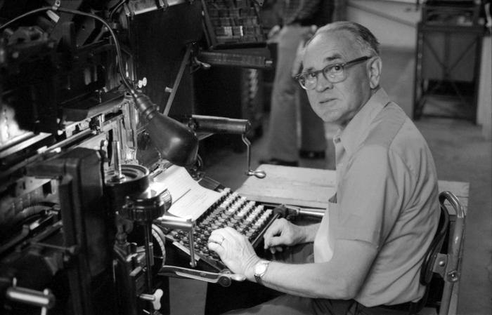 Walter Ellis, seated at keyboard, looking at the camera, 1973 (2nd)