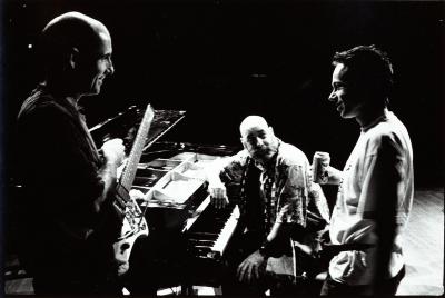 Half length portrait of Henry Kaiser, Greg Goodman, and Lukas Ligeti during rehearsal, San Francisco, CA (1996)