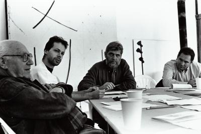 David Raksin, Lukas Ligeti, Charles Shere, and Ionel Petroï seated around a table, Woodside, CA (1996)