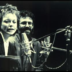 Laurie Anderson and Charles Amirkhanian, at microphones during Speaking of Music, San Francisco (1984)
