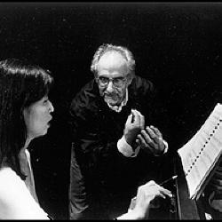 Gloria Cheng-Cochran, seated, facing right, & António Pinho Vargas, standing, facing forward, during a rehearsal, San Francisco CA, (1999)
