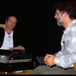 John Oswald and Charles Amirkhanian in discussion onstage at the Exploratorium, vs. 2, San Francisco (1990)