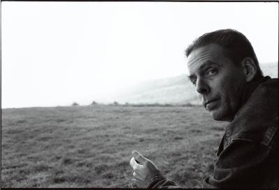 Peter Garland, head and shoulders portrait, head turned towards camera, Woodside CA, (2000)