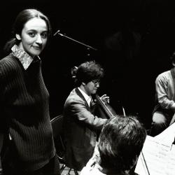 Aleksandra Vrebalov, standing and facing forward and Leighton Fong, & Kurt Rohde playing their instruments, San Francisco CA, (2001)