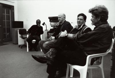 Full length portrait of Andrew Hill, Gavin Bryars, Alvin Curran, and James Tenney, seated in a room during Other Minds 7, San Francisco (2001)
