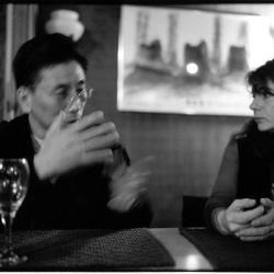 Ge Gan-ru and Evelyn Glennie, head and shoulders portrait, seated at dinner table, 2003 (cropped image)