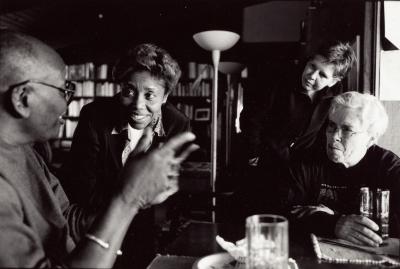 Half length portrait of Randy Weston in discussion with Tania León, Ellen Fullman, and Pauline Oliveros, Woodside CA, (2002)