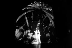 Amelia Cuni, standing, facing forward, during a performance of “Ashtayama: Song of Hours,” San Francisco CA, (2004)