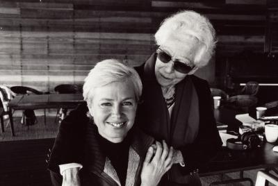 Joan Jeanrenaud, seated, facing camera, being embraced by her mother, Jane Dutcher, standing, Woodside (cropped image)