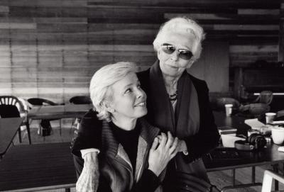 Joan Jeanrenaud, seated, being embraced by her mother, Jane Dutcher, standing, Woodside (cropped image)