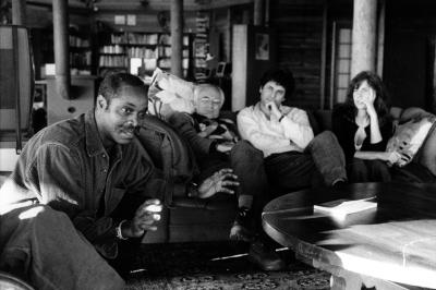 Alex Blake, sitting on floor talking, with Tigran Mansurian, Hamlet Sarkissian, and Hanna Kulenty, seated on couch listening, Woodside CA, (2004)