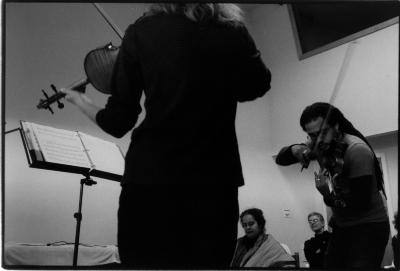 Kate Stenberg, standing, back to camera, and Daniel Bernard Roumain playing violin, Woodside, CA (2005)