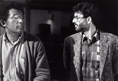 Anthony Braxton and Charles Amirkhanian, heads and shoulders portrait, looking at each other, San Francisco, 1985