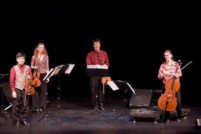Del Sol Quartet performing on stage during OM 11, ver. 15