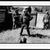 Fred Frith at ground level in a site sculpture, with Michael Nyman, Daniel Bernard Roumain, and Billy Bang, standing above, Woodside, CA (2005)