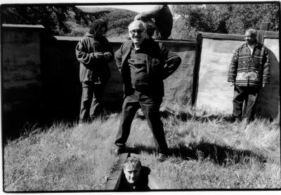 Fred Frith at ground level in a site sculpture, with Michael Nyman, Daniel Bernard Roumain, and Billy Bang, standing above, Woodside, CA (2005)