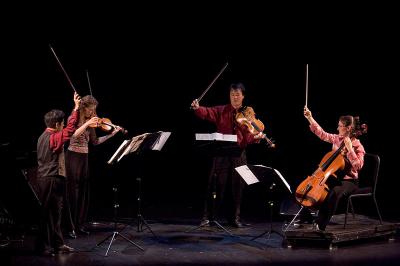 Del Sol Quartet performing on stage during OM 11, ver. 13