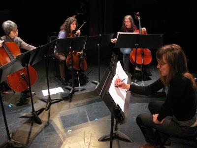 Cellists Thalia Moore, Gianna Abondolo, Erika Duke-Kirkpatrick, & composer Catherine Lamb (l to r) during a rehearsal of “Dilations,” prior to its world premiere at OM 14, San Francisco CA., (2009)