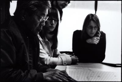Chinary Ung, Catherine Lamb, and Dobromiła Jaskot, (l to r), seated around table, looking at musical score, Woodside CA., (2009)