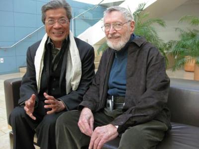 Chinary Ung & Ben Johnson (l to r), seated, three length portrait, facing forward, San Francisco CA., (2009)
