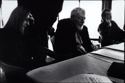 Dobromiła Jaskot, Ben Johnston, and John Schneider (l to r), seated at table, looking down and slightly right, Woodside CA, (2009)