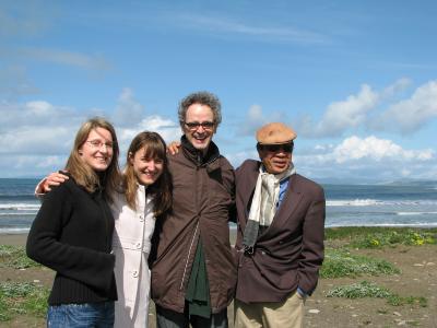 Dobromiła Jaskot, Catherine Lamb, Chico Mello, & Chinary Ung, three quarter length portrait, standing, facing forward, along the California coast, (2009)