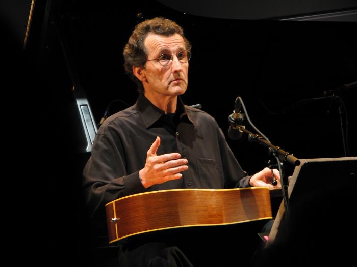 John Schneider, half length portrait, facing slightly right, with instrument in his lap, San Francisco