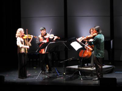 The Del Sol String Quartet, full length portrait, rehearsing for OM 14