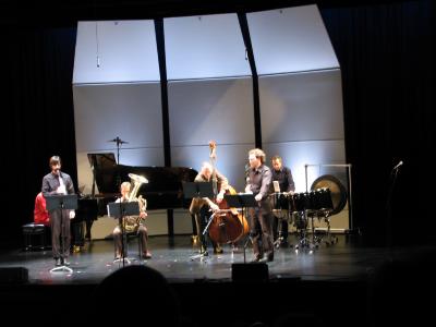 A musical sextet, full length portrait, performing on stage, San Francisco CA., (2009)