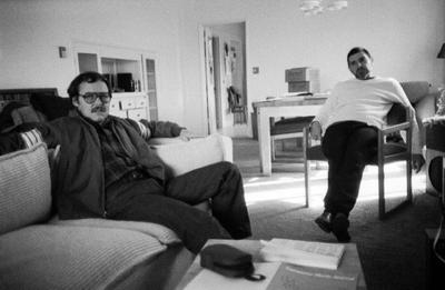 Tom Bendon and Anthony Gnazzo (l to r), full length portrait, seated, facing forward, Oakland CA., (1982)
