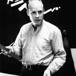 Brian Eno, with ruler in hand, working on an installation at the Exploratorium 