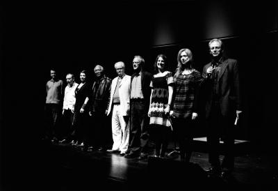 The featured OM 15 composers, standing, facing forward, on stage, San Francisco (cropped image)