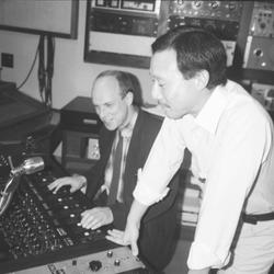 Brian Eno at the control board in the KPFA studio with engineer Michael Yoshida, 1988
