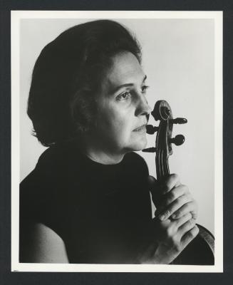 Head and shoulders portrait of Anahid Ajemian with violin, (ca. 1960s-70s)