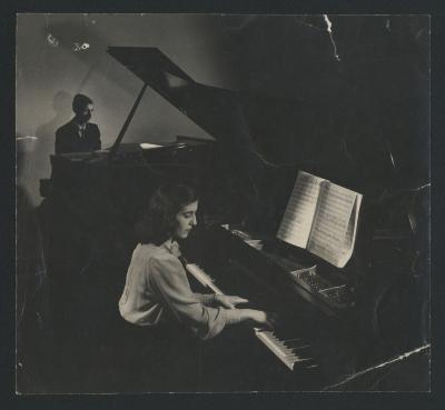 Portrait of Maro Ajemian and Alan Hovhaness playing pianos (1946)