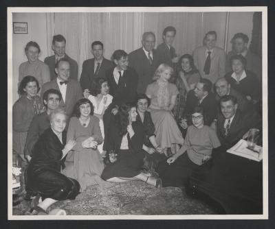 Portrait of a large group of artists including Maro and Anahid Ajemian, Alan Hovhaness and others, at a house party (ca.1940s)