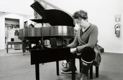 Myra Melford playing a toy piano at the Djerassi Resident Artists Program prior to OM 19 (2014)