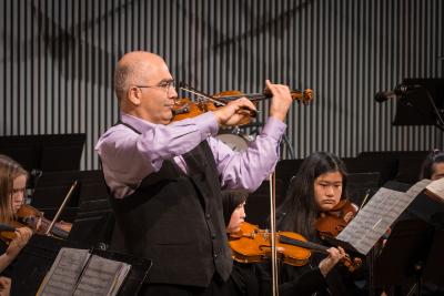 Violinist Movses Pogossian performing during the third concert of OM 20, San Francisco CA (2015)