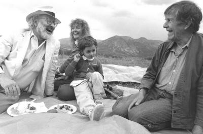 Morton Subotnick, Joan La Barbara, and their son Jacob seated on a picnic spread with John Cage, Telluride, CO. (1989)