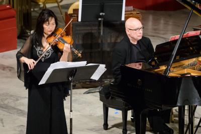 Yumi Hwang-Williams and Dennis Russell Davies performing Isang Yun's Gasa for violin and piano during the first concert of OM 22