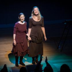 Meredith Monk and Katie Geissinger standing onstage facing audience after a performance at OM 21, San Francisco CA (2016)