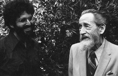 Charles Amirkhanian & Dane Rudhyar (l to r), head and shoulders portrait, looking at each other, Berkeley CA., (1977)